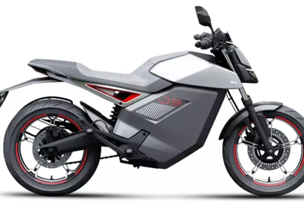 A sleek, modern electric motorcycle featuring LED projector headlights, diamond-cut alloy wheels, and a 10-inch TFT touchscreen display. The bike showcases a futuristic design with a dynamic, high-performance appearance, ideal for both city commuting and long-distance rides.