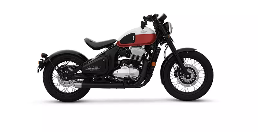 Jawa 42 Bobber, a stylish single-seater motorcycle with a retro-inspired design, featuring a teardrop-shaped fuel tank, round headlamp, wide handlebars, and vibrant color options